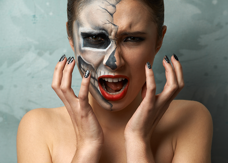 Woman wearing scary halloween makeup