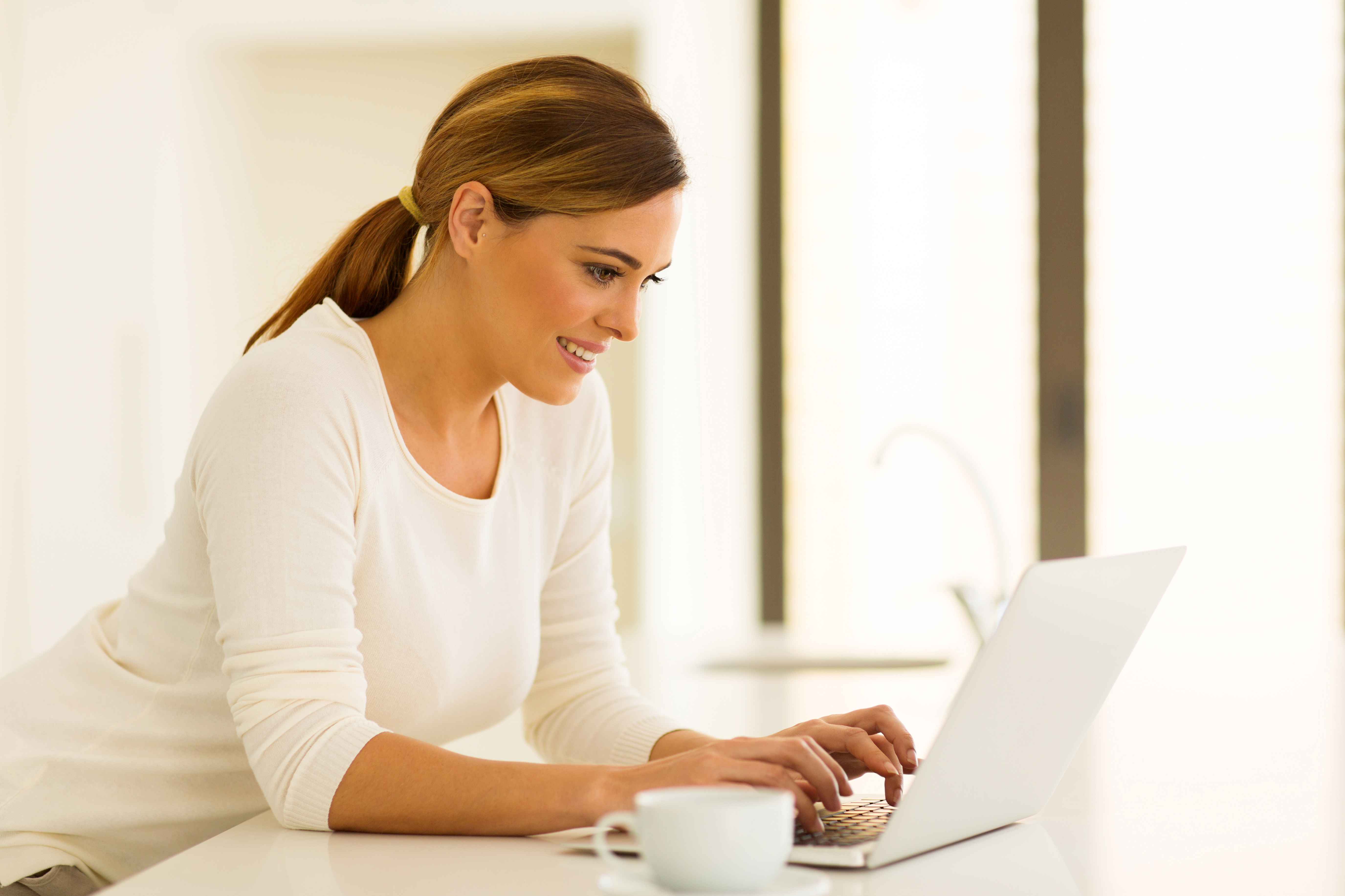 Beauty salon owner reading emails