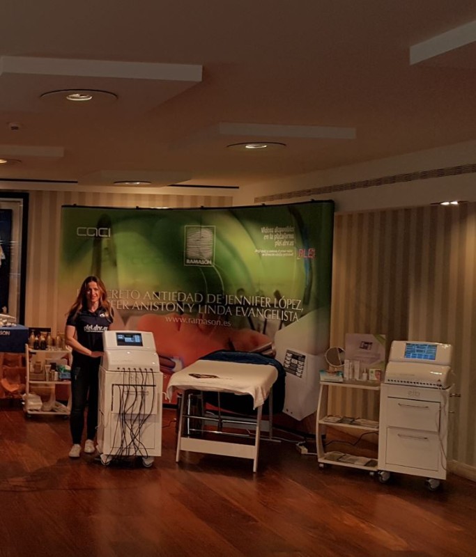 A Grupo DRV Phytolab team member stand with CACI devices